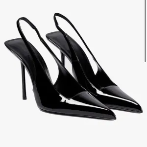 Excellent condition black sling back heels